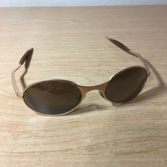 Rare Vintage OAKLEY E Wire Sunglasses Gold Tone Metal Frame Oval Lens Y2k - Picture 1 of 9